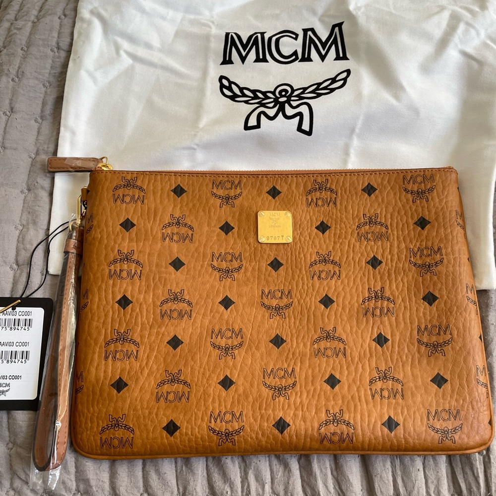EUC MCM Visetos Pouch Bag